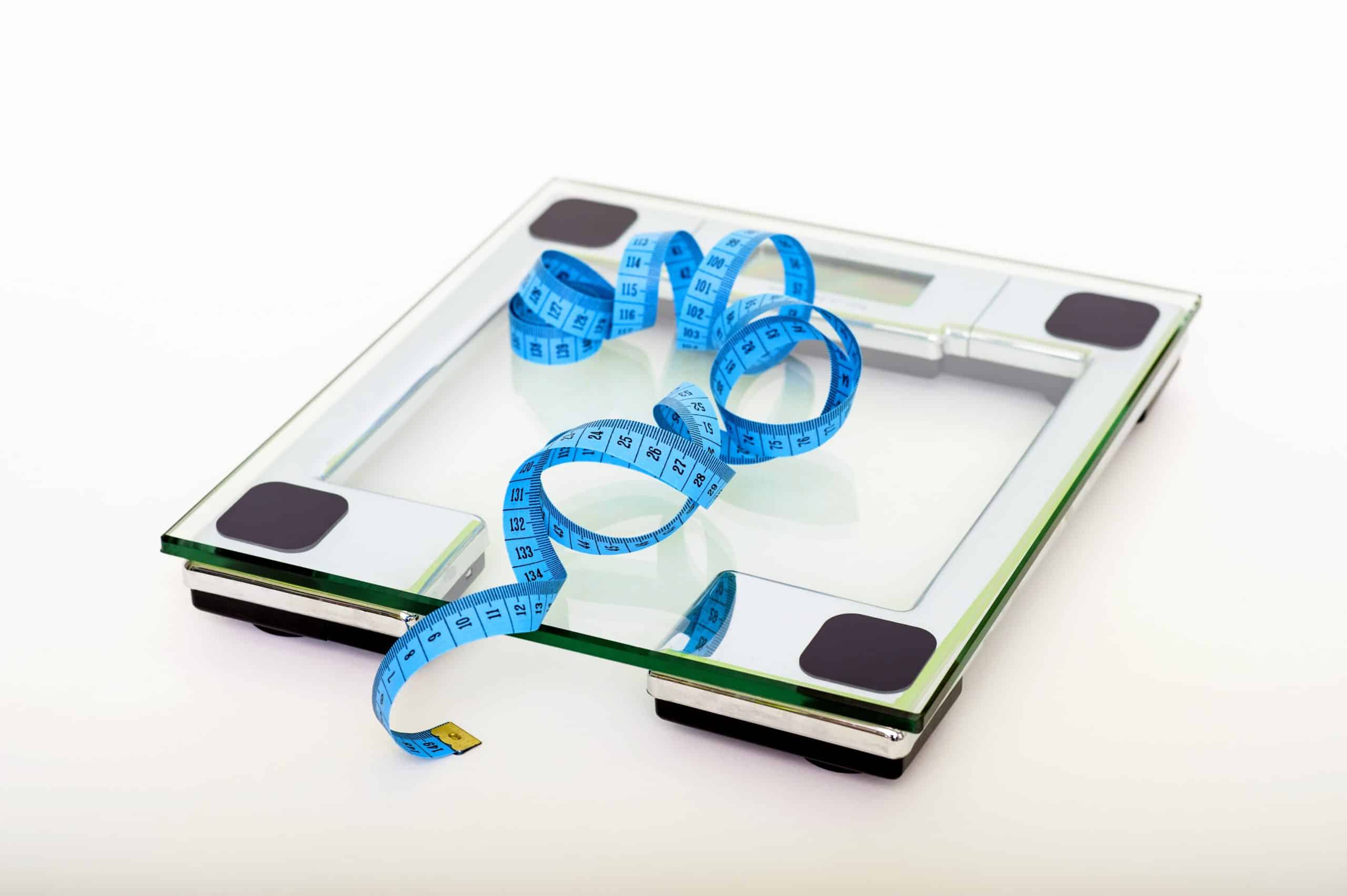 Losing weight on the weighing scale and measure