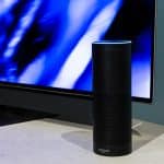 a picture showing an Alexa speaker connected to a smart TV